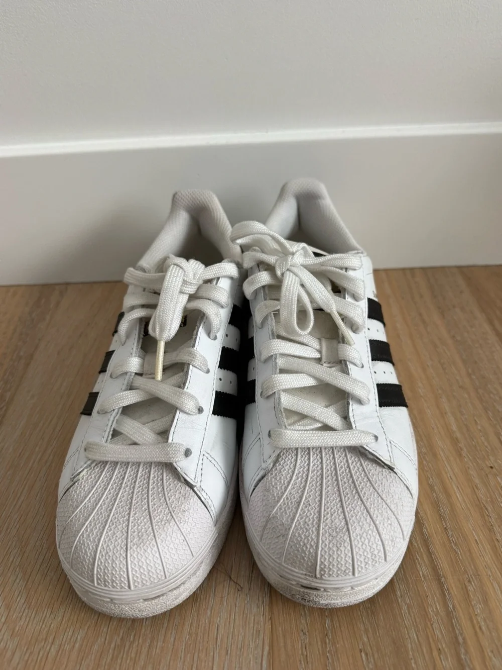 adidas Superstar Sneakers in White and Black